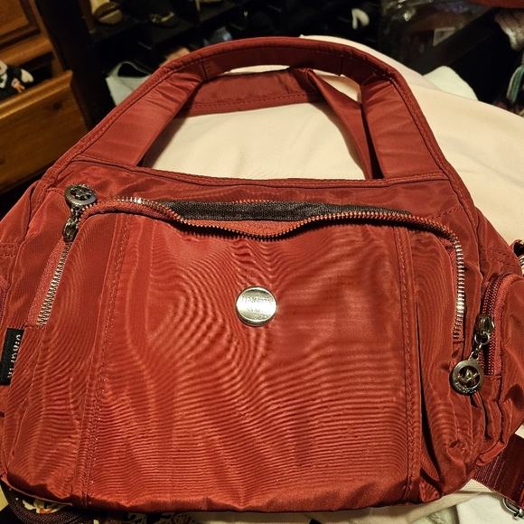 A small shoulder or crossbody purse with a ton of pockets to carry everything! - Picture 1 of 15